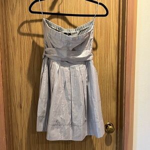 Strapless dress, with pocket pockets